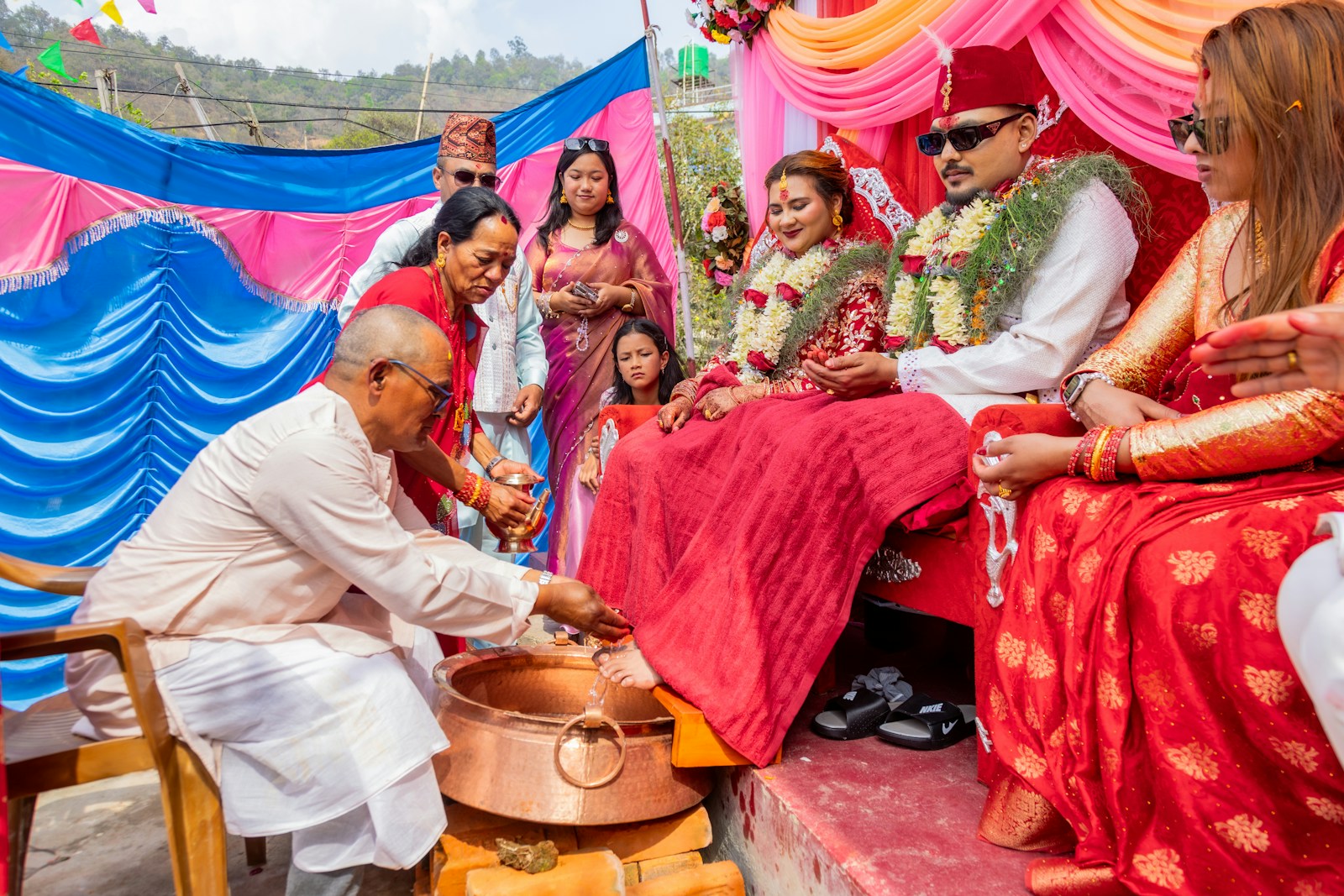 Guests and officiants taking part in a wedding ceremony
