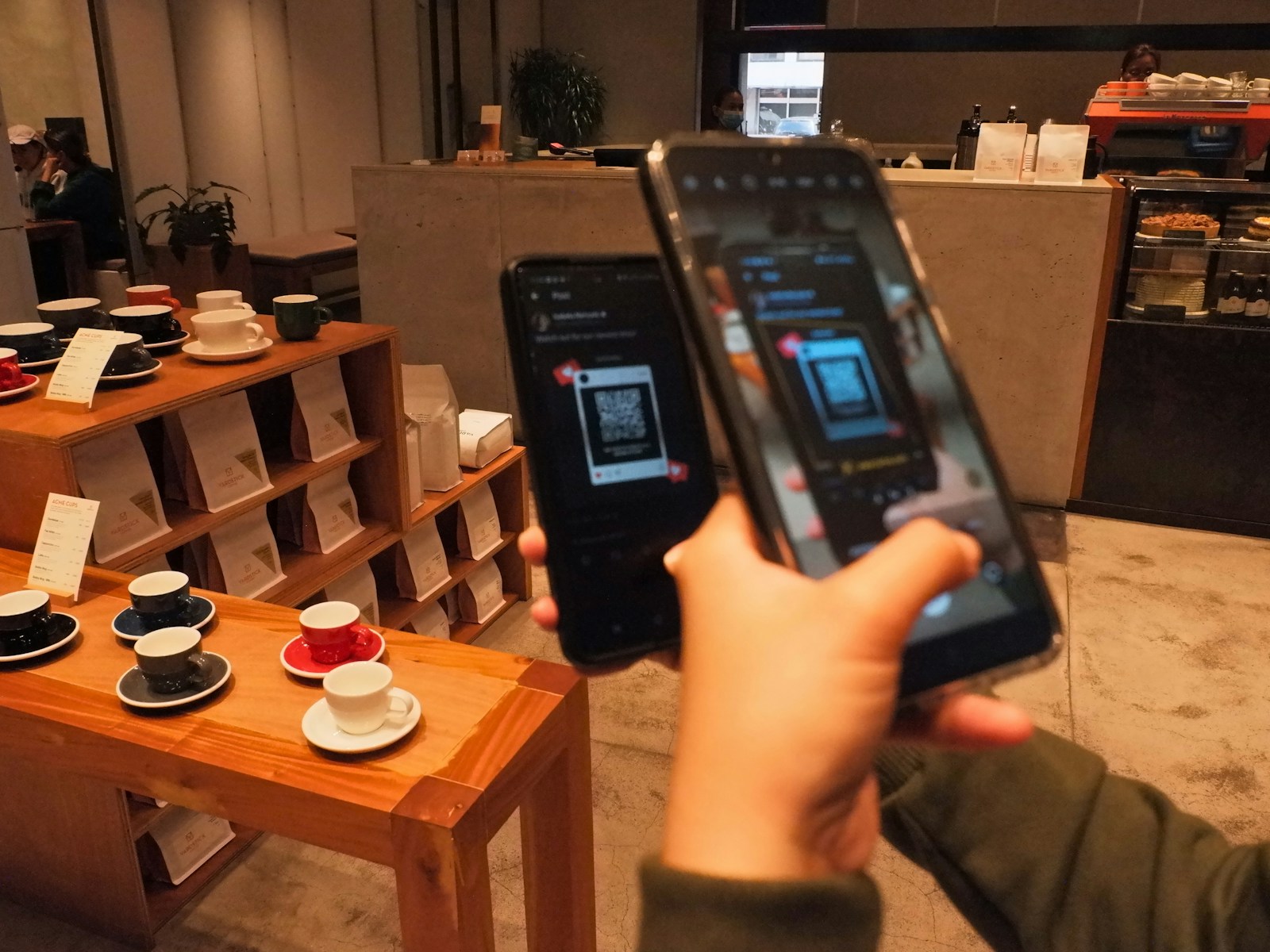A guest scanning a QR code with a smartphone