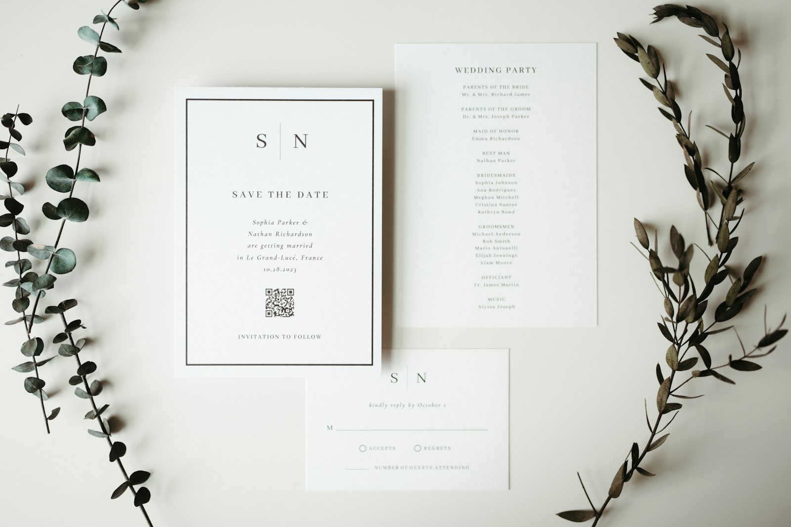 A modern wedding invitation suite with flowers