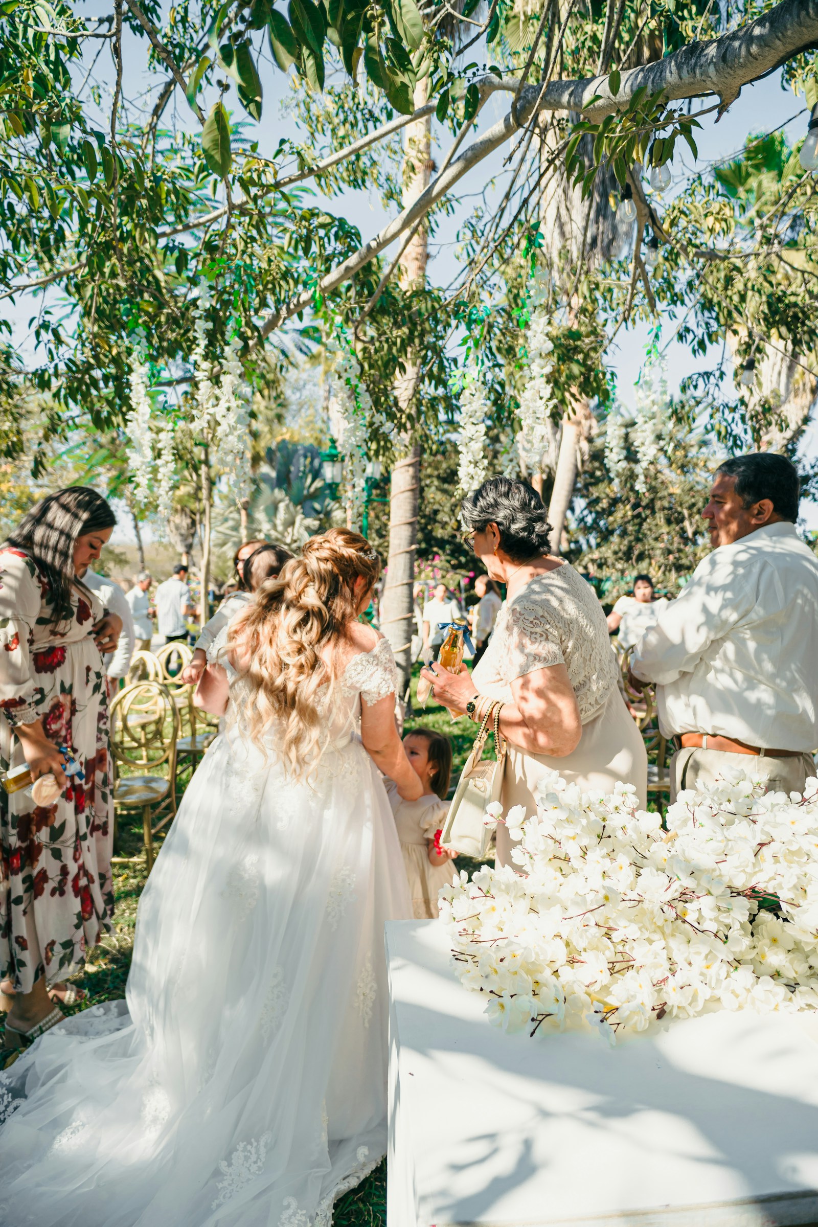 Wedding guests gathering outdoors