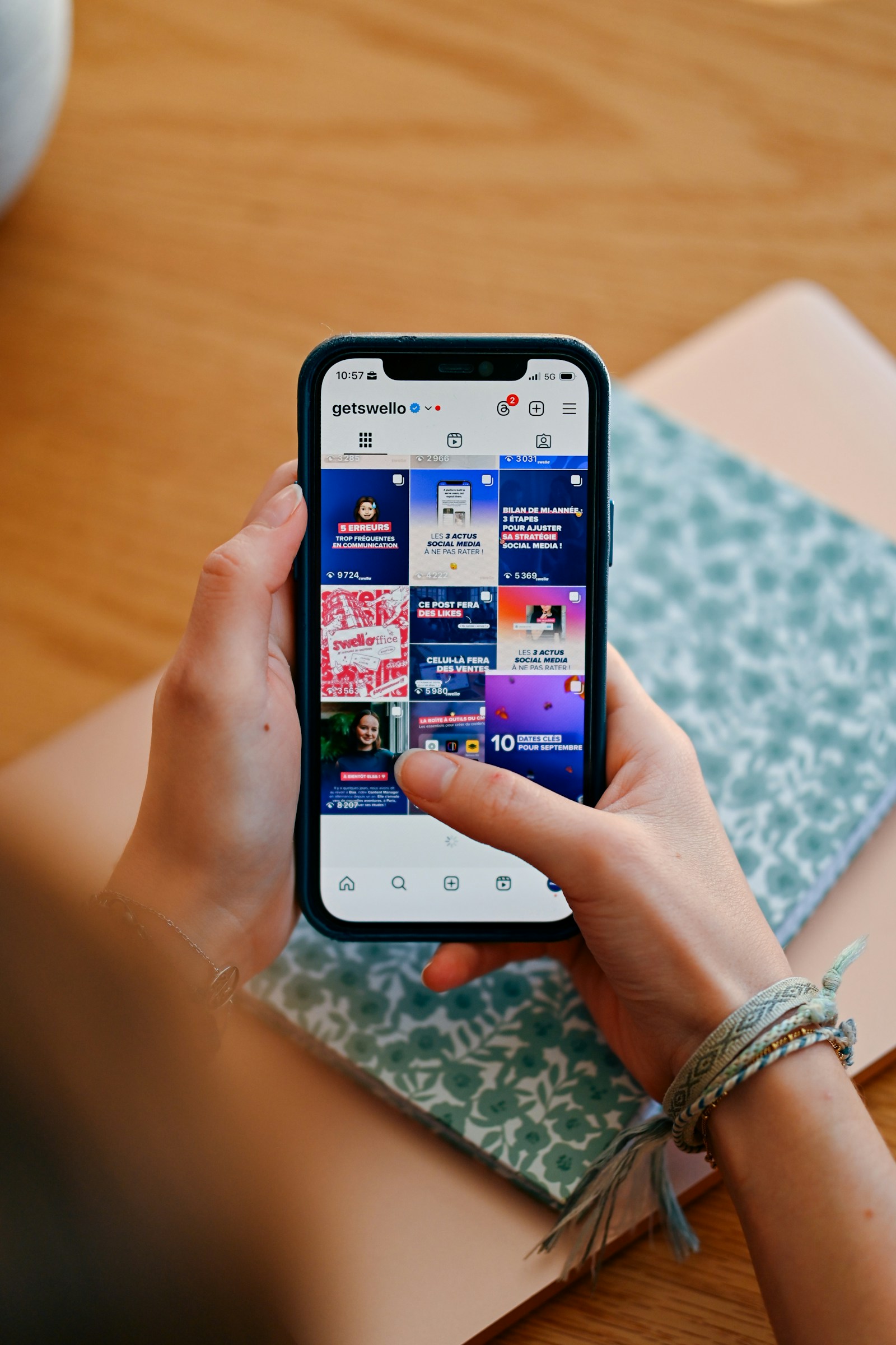 A creator browsing a social media feed on a smartphone