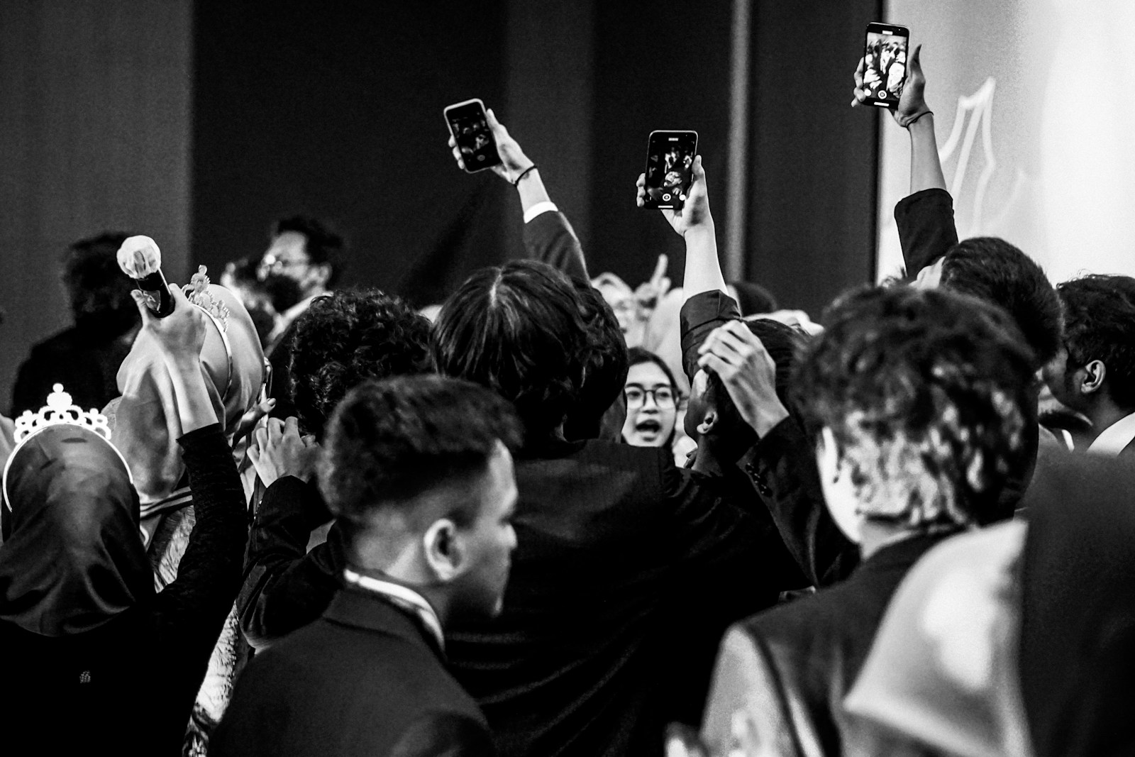 Guests recording an event on their phones